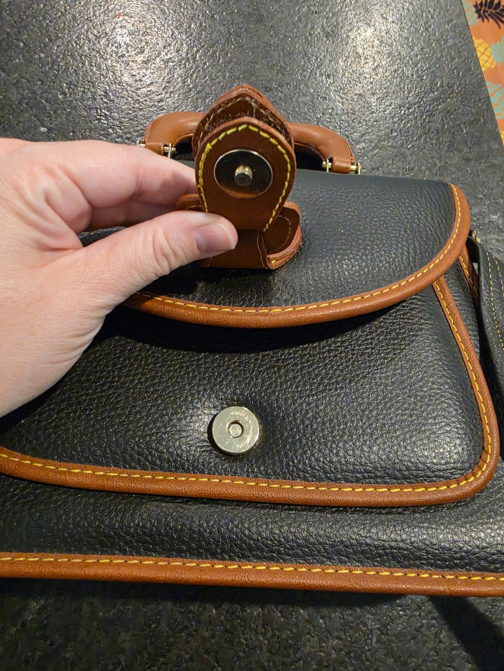 Dooney & Bourke Black Leather Satchel with Brown Trim and Brass Accents - Picture 4 of 9